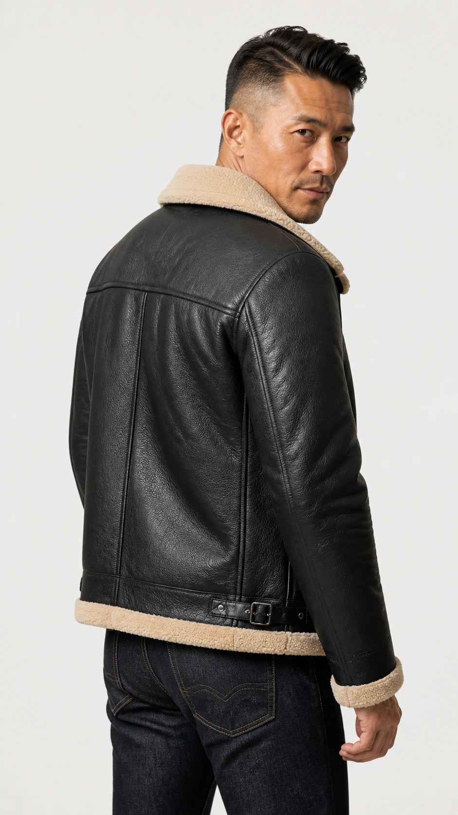 Back view of a man in the black B-3 shearling jacket