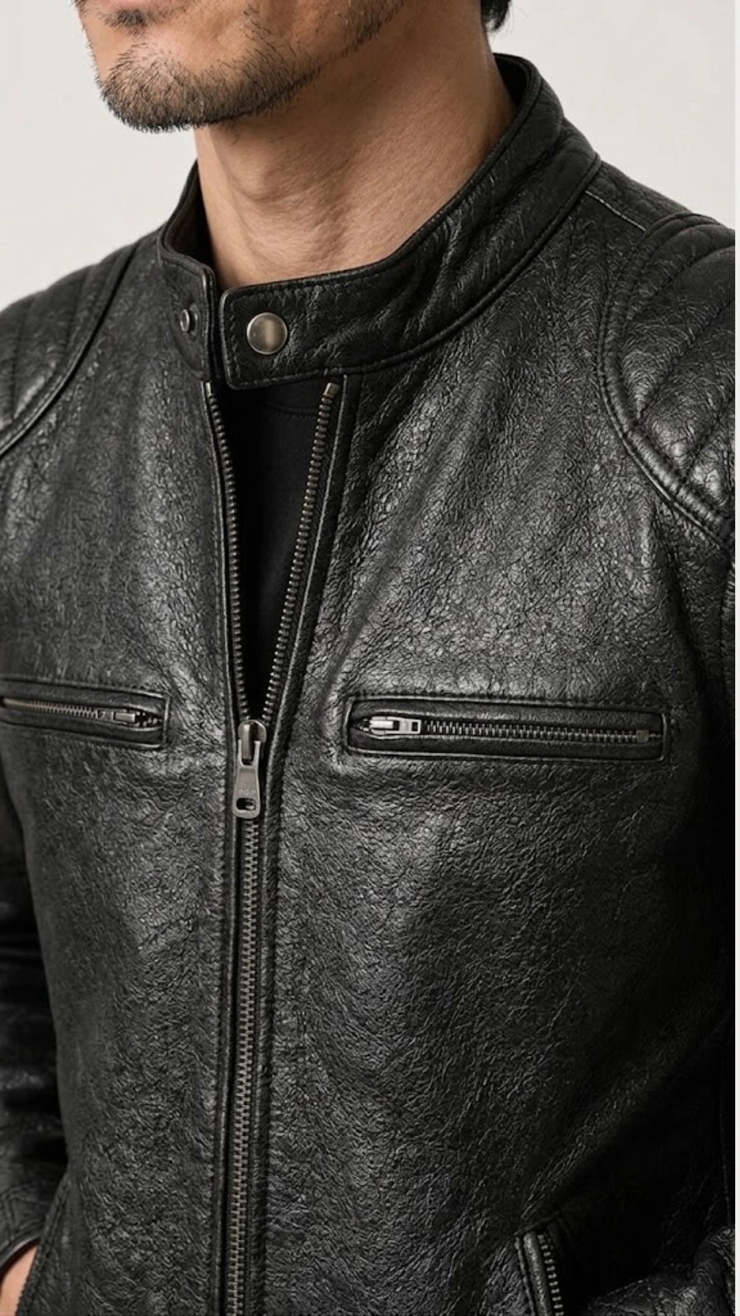 Close-up of the stand collar and press stud on the black cowhide