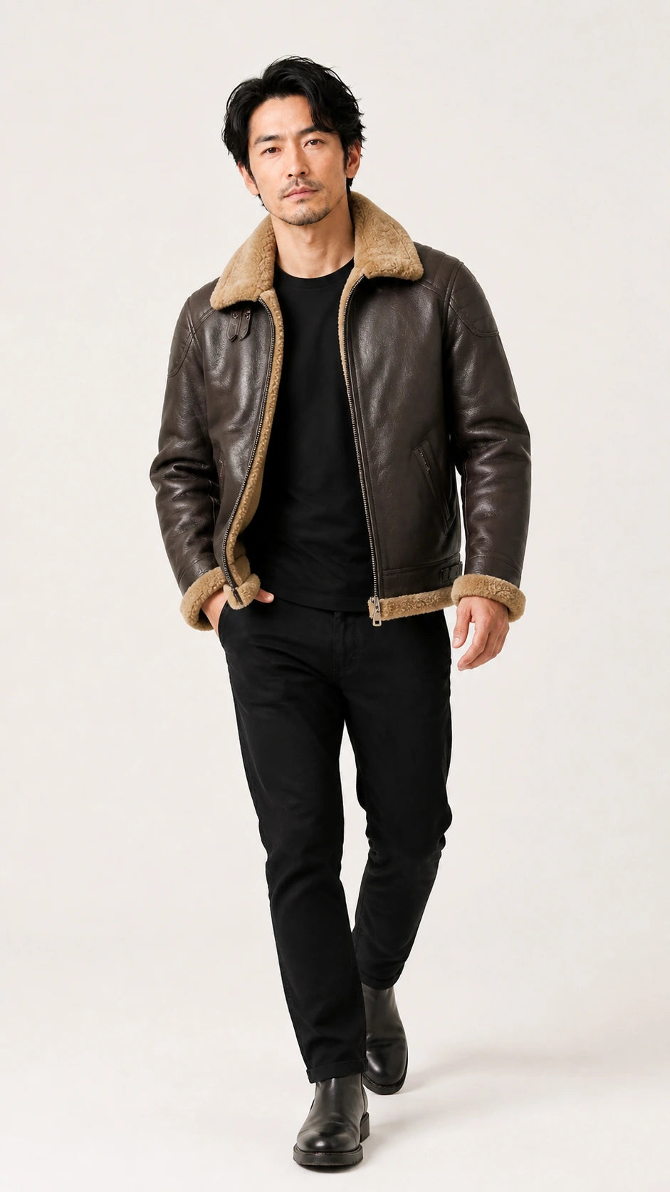 Full-length walking shot of the brown shearling flight jacket