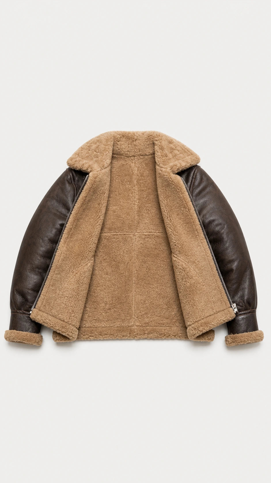 Brown B-3 jacket opened flat to show the full tan shearling interior