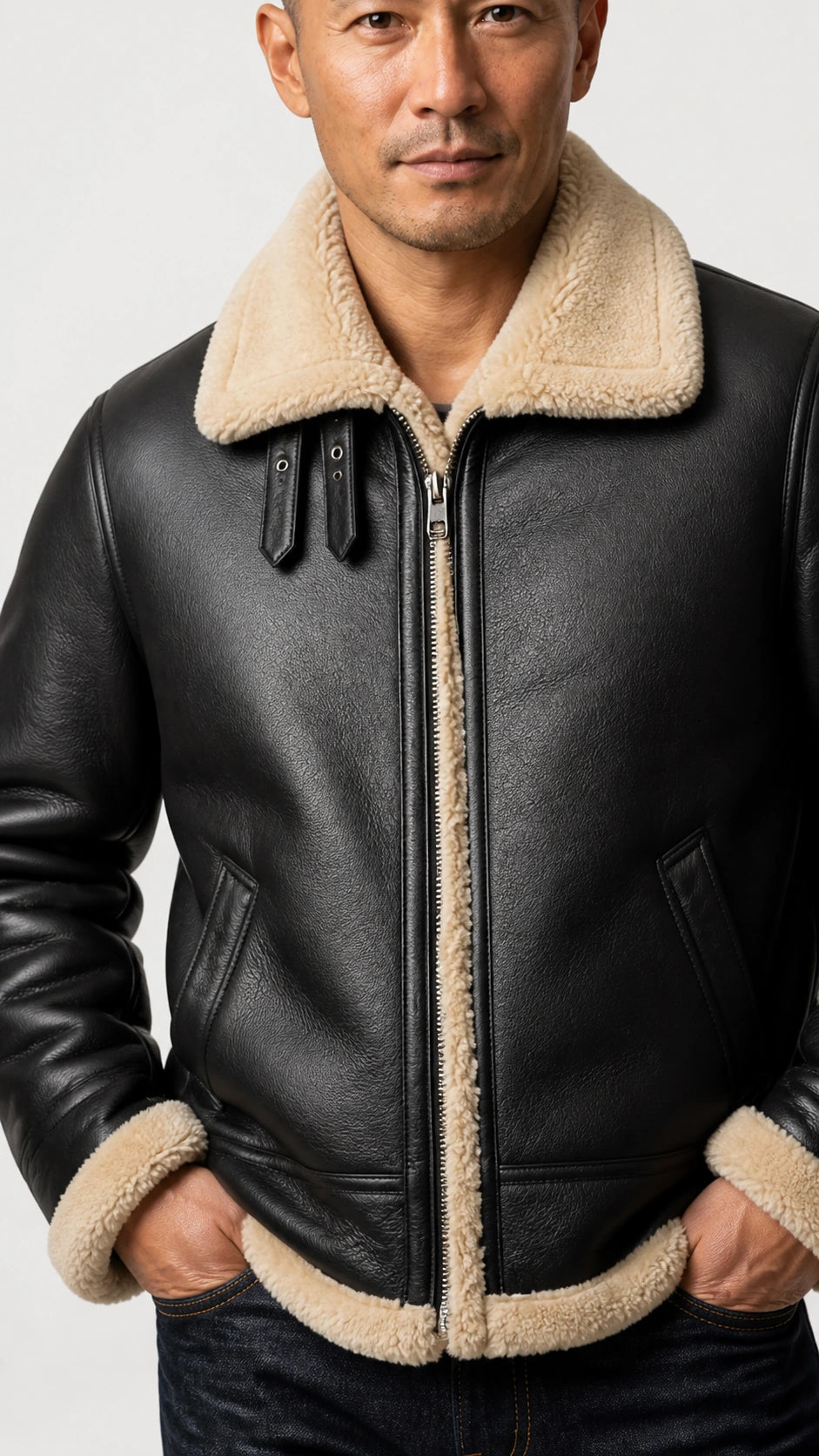 Man wearing the black shearling flight jacket with hands in pockets